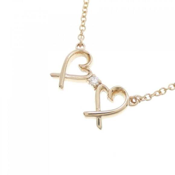 Return to Tiffany®:Mini Heart Tag Pendant in Yellow Gold  TIFFANY Gold Heart Necklace